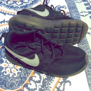 Kids black Nikes